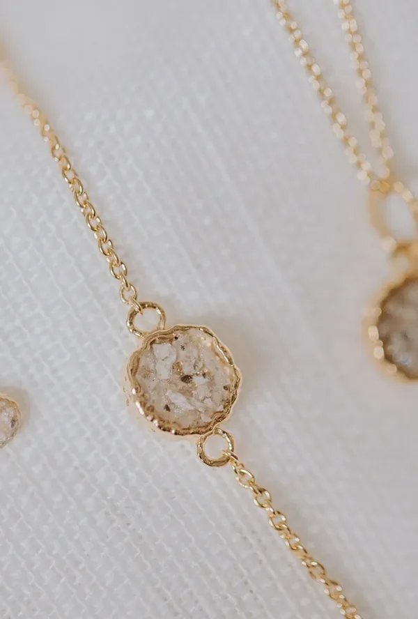 Round as armband/assieraad goud set