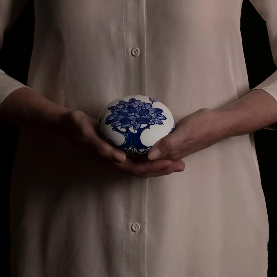 Royal Delft Memento Blue Pebble Tree of Life mini urn hand