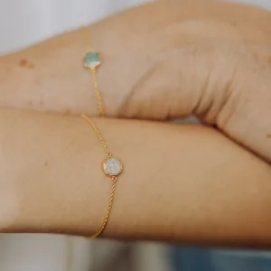 Round as armband/assieraad goud turkoois parelmoer