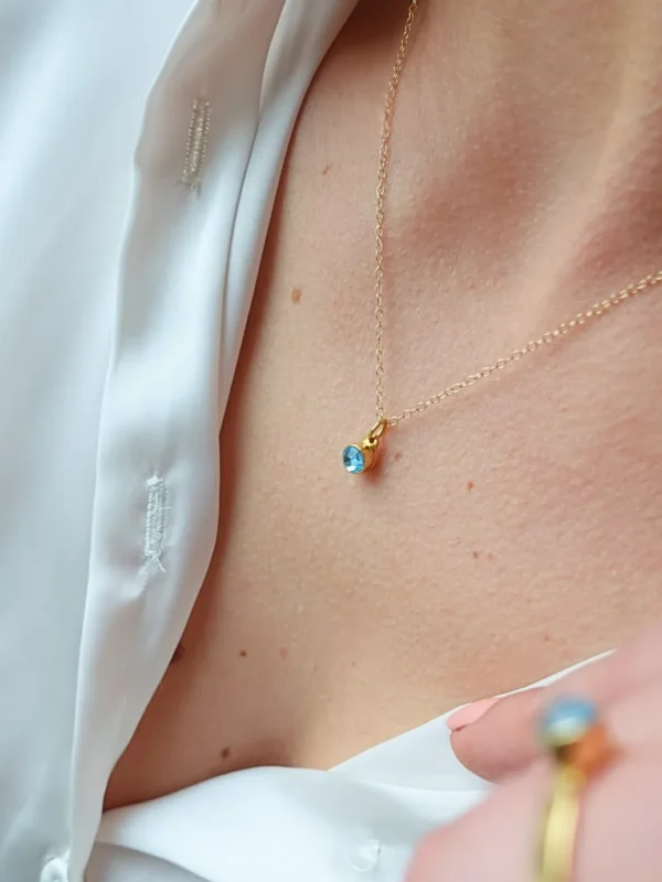 Birthstone ashanger / assieraad maart aquamarijn goud model