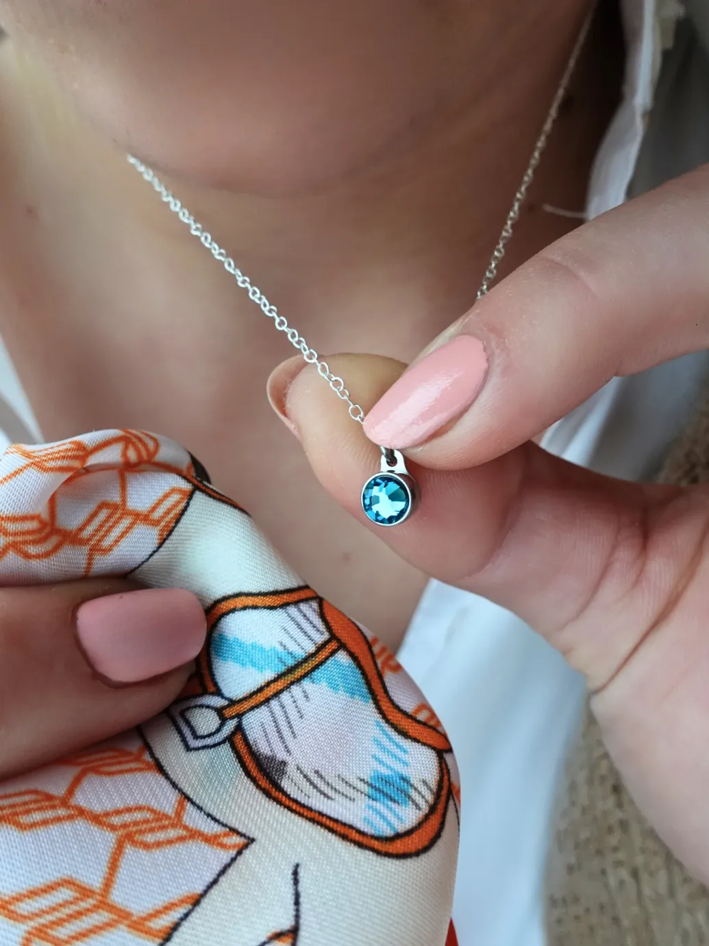 Birthstone ashanger / assieraad december blauwe topaas edelstaal model