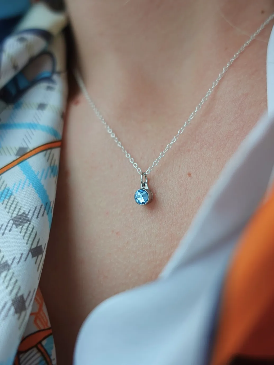 Birthstone ashanger / assieraad maart aquamarijn edelstaal model